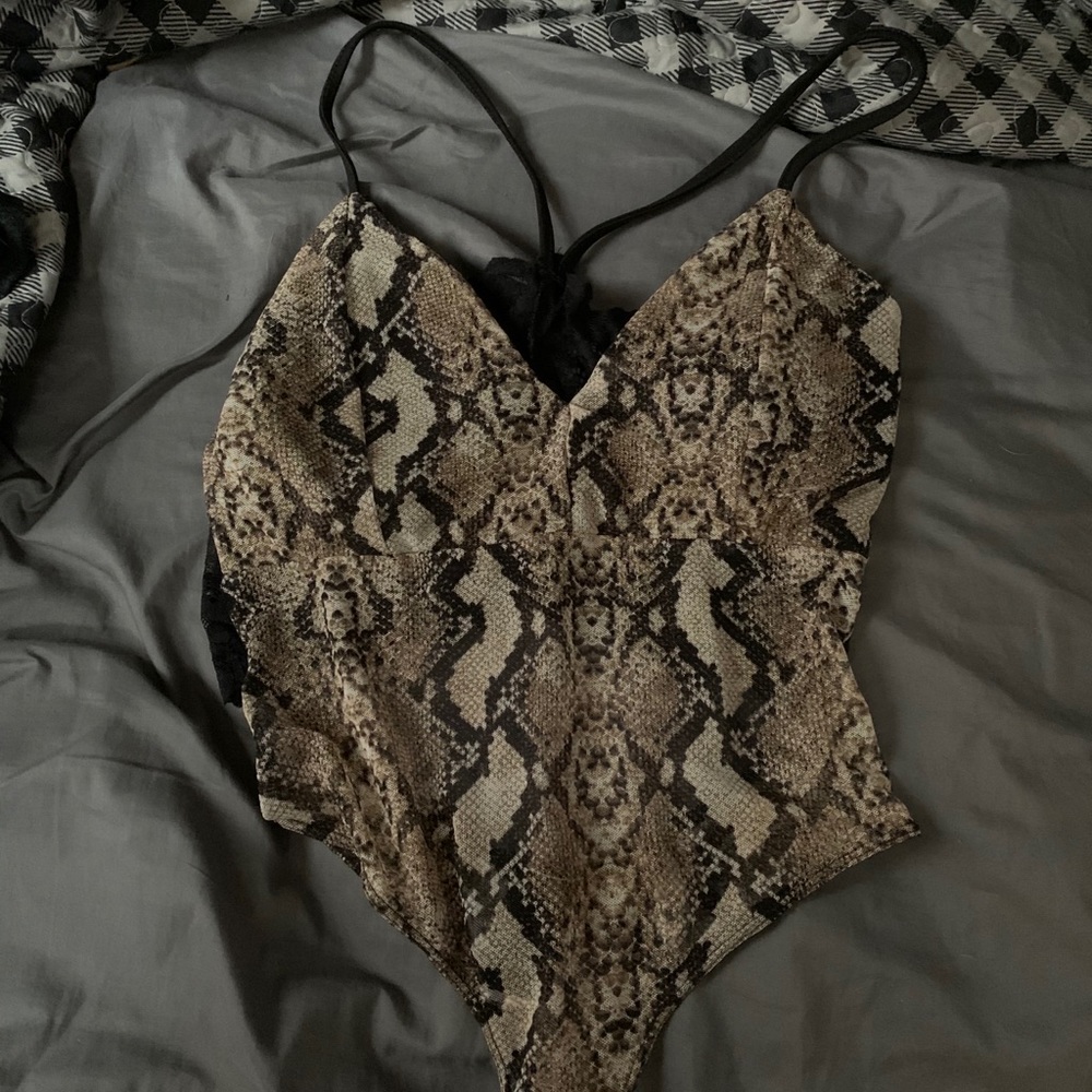 Two Rue21 bodysuits, can be layered with anything.